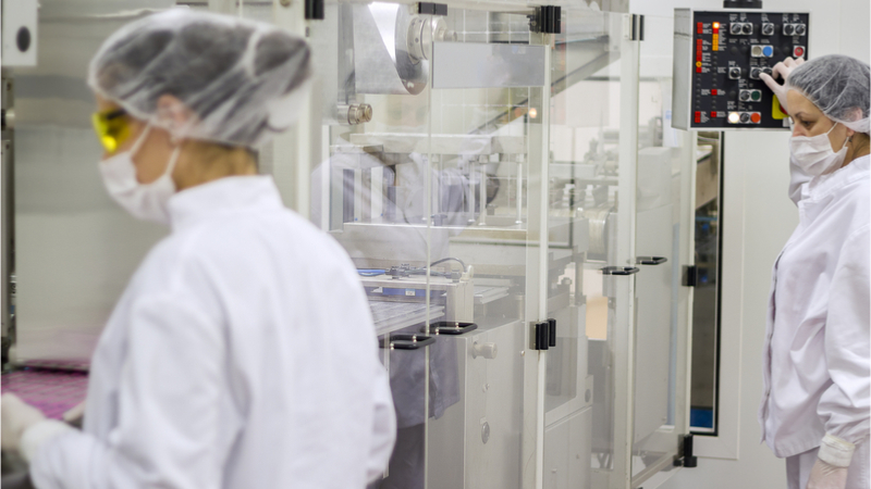 Pharmaceuticals production line workers