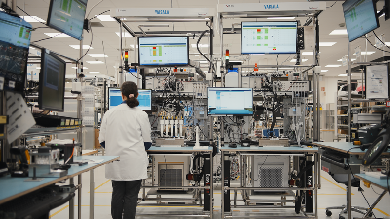 Vaisala factory cell with factory worker.