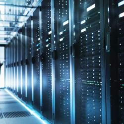 Man in datacenter corridor